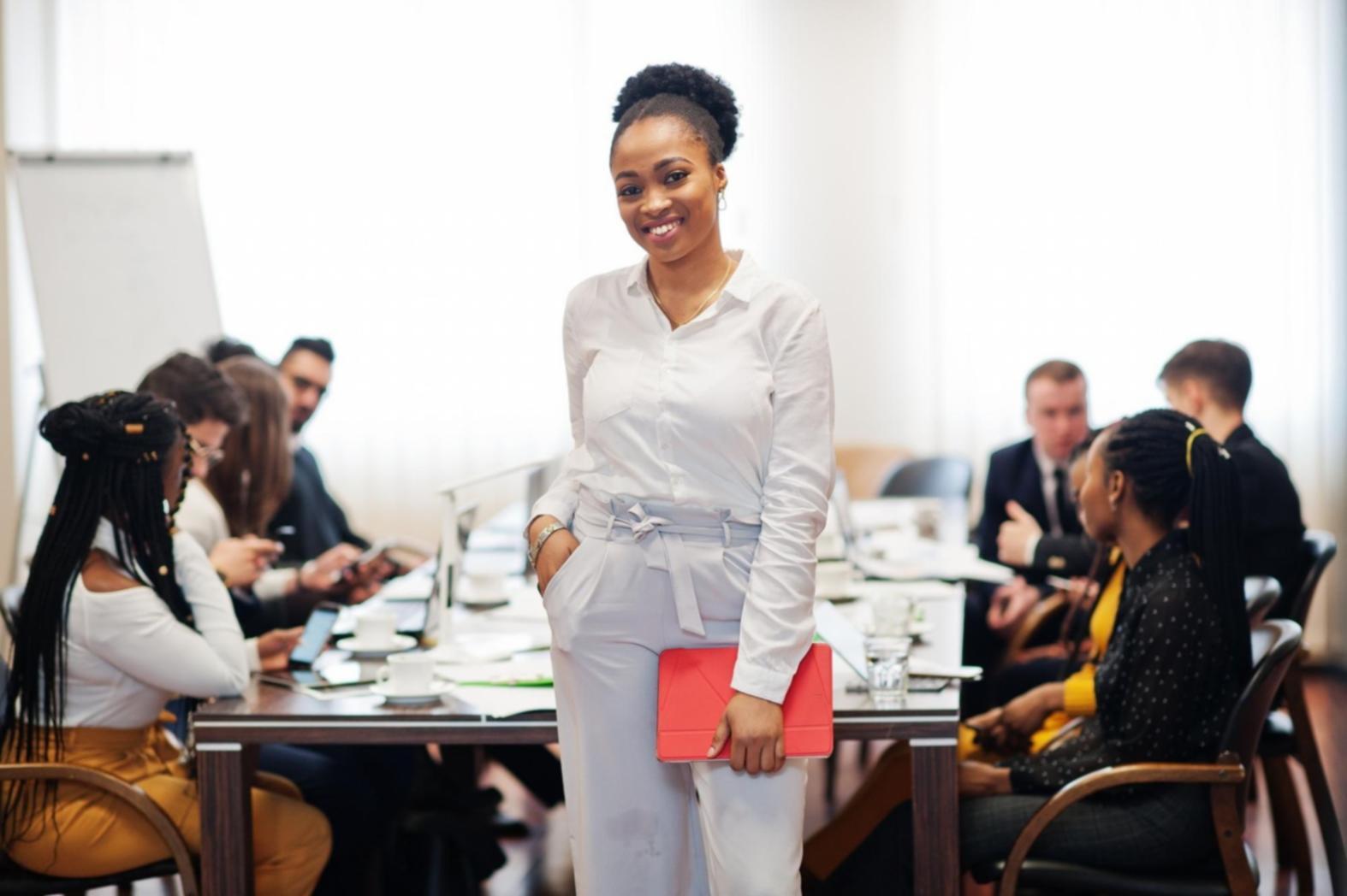 Financial education workshop session with participants learning about banking services